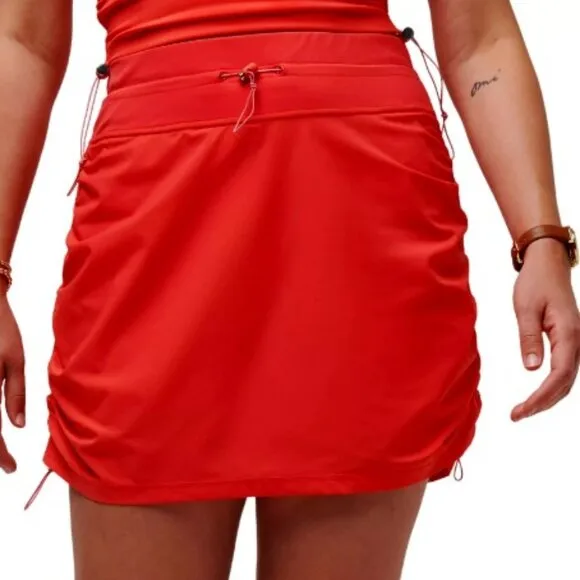 TravisMathew Women's Dune Grass Golf Skort- Cayenne